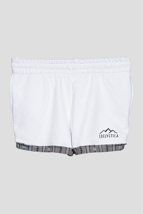 Damen Shorts von Edelvetica mit Edelweiss-Abschluss und Logo, eine modische und praktische Wahl für Freizeitaktivitäten. Diese Shorts zeichnen sich durch ein charakteristisches Edelweiss-Muster am Abschluss und das Edelvetica-Logo aus, was einen Hauch von alpiner Eleganz und Markenidentität verleiht. Ideal für Frauen, die lässige, aber stilvolle Kleidung schätzen.